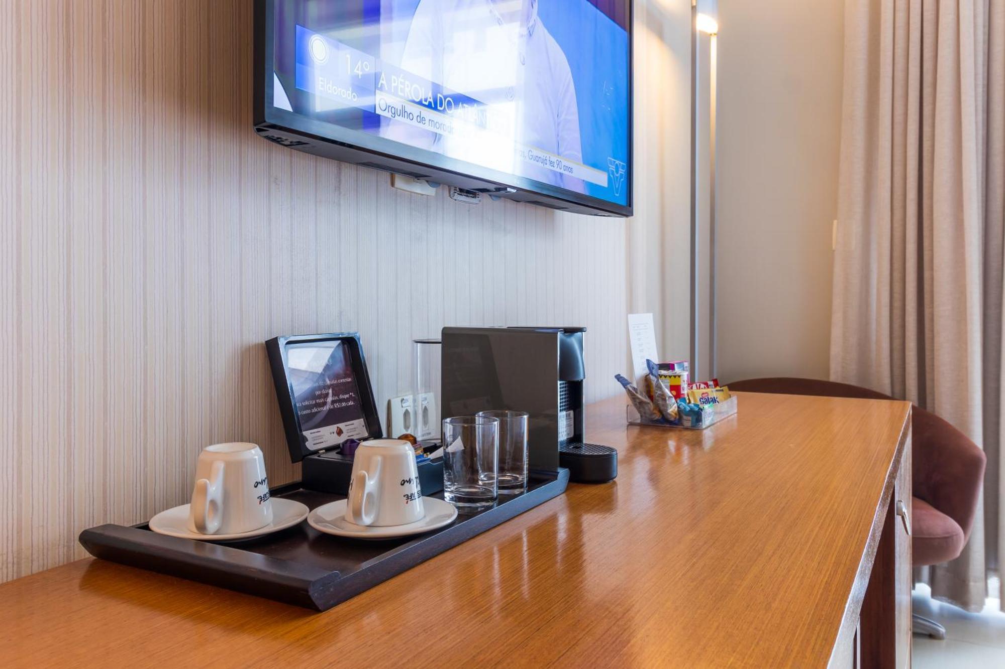 Parque Balneario Hotel Santos By Castelo Itaipava Room photo A Nespresso machine in a hotel room